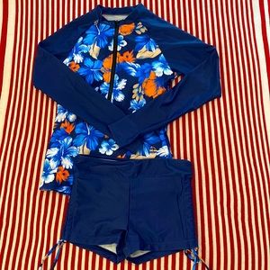 Swimsuit, shorts and long sleeve top